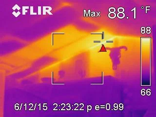 Infrared thermal image revealing heat loss patterns around window frames during a Durango home…